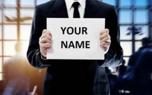 Driver waiting with name sign